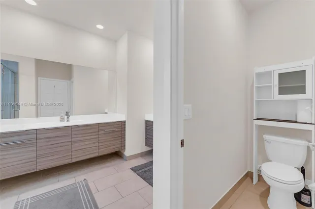 a bathroom with a sink toilet bathtub and shower