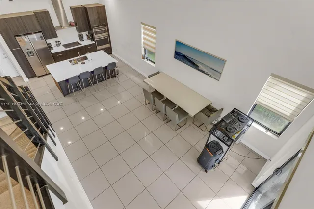 a view of a hallway with seating space