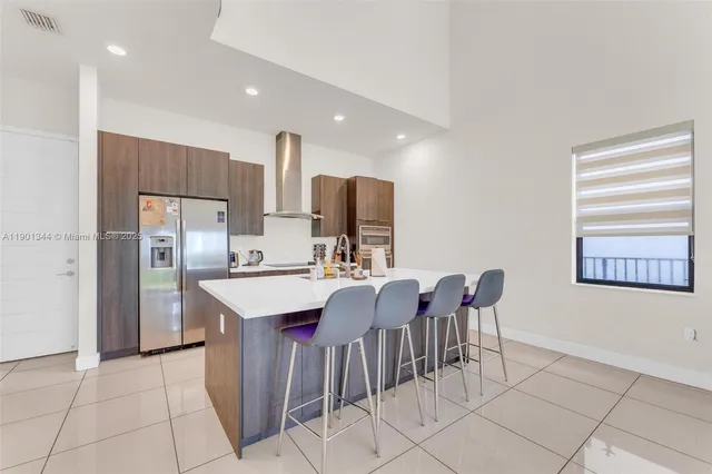 a view of kitchen with breakfast area