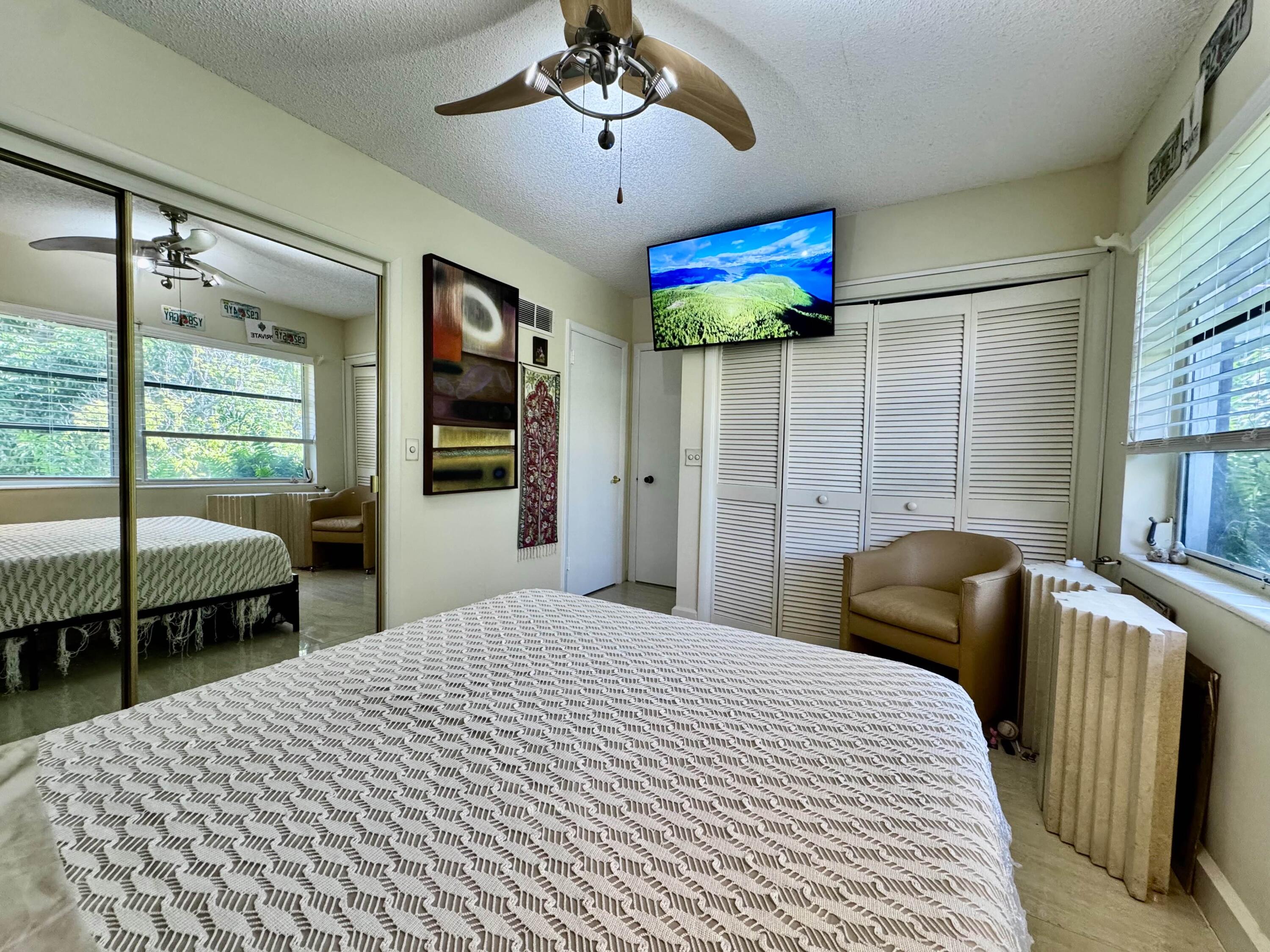 2802 Southwest 4th Street Boynton Beach, FL 33435 - Photo 21 of 42 a bedroom with bed and window