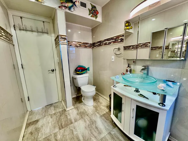 a view of house with swimming pool outdoor seating