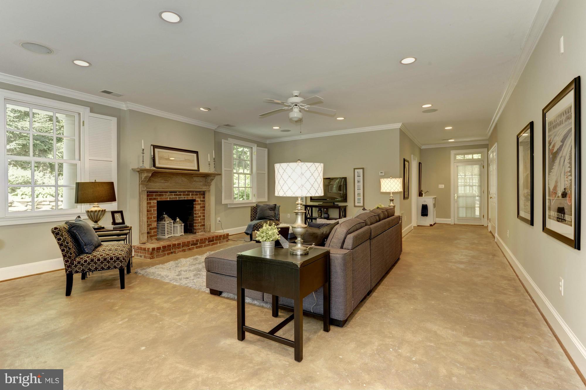 7414 Dulany Drive McLean, VA 22101 - Photo 14 of 30 a living room with furniture and a fireplace
