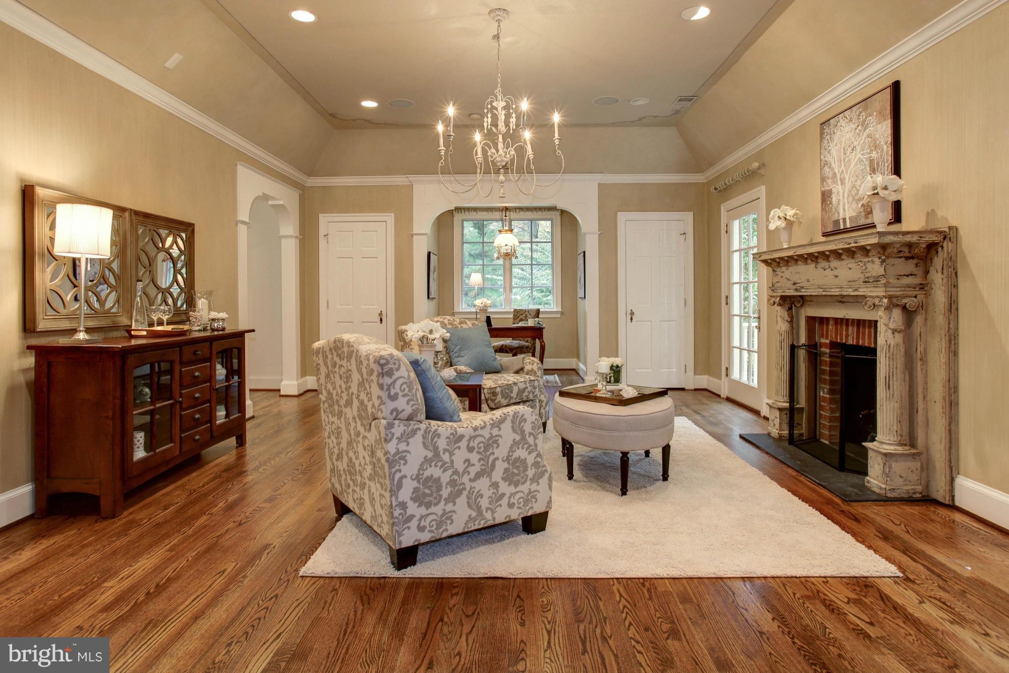 7414 Dulany Drive McLean, VA 22101 - Photo 17 of 30 a living room with furniture and a fireplace
