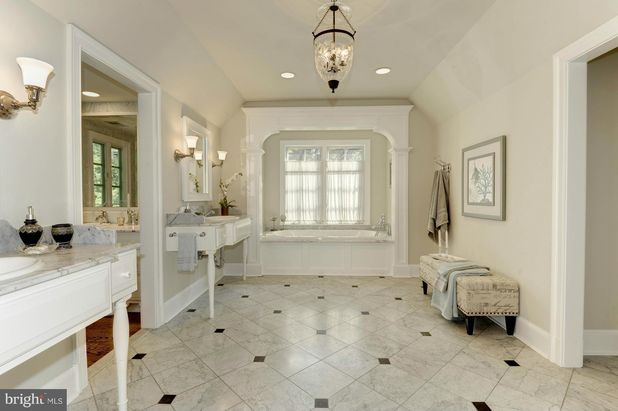 7414 Dulany Drive McLean, VA 22101 - Photo 18 of 30 a spacious bathroom with a sink toilet and shower