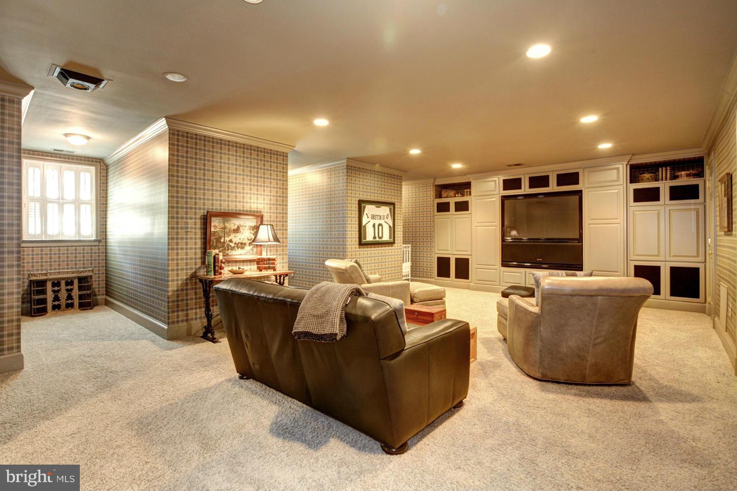 7414 Dulany Drive McLean, VA 22101 - Photo 23 of 30 a living room with furniture kitchen view and a large window