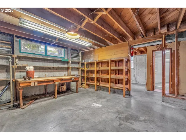 a view of an empty room with a balcony