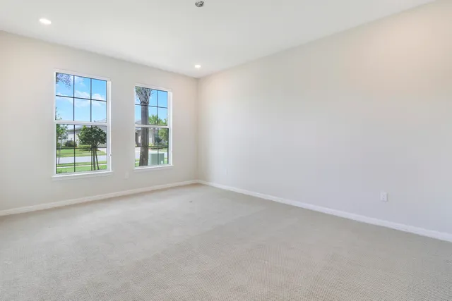an empty room with windows