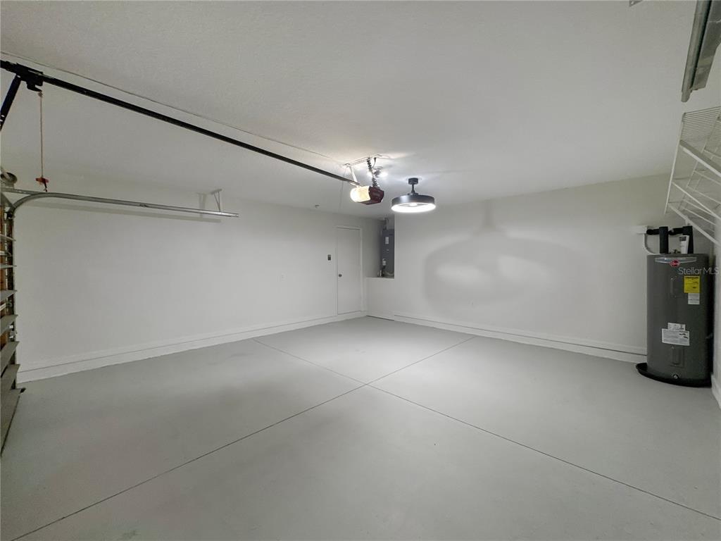 2109 Aitkin Loop Leesburg, FL 34748 - Photo 27 of 33 a view of a livingroom with a fireplace