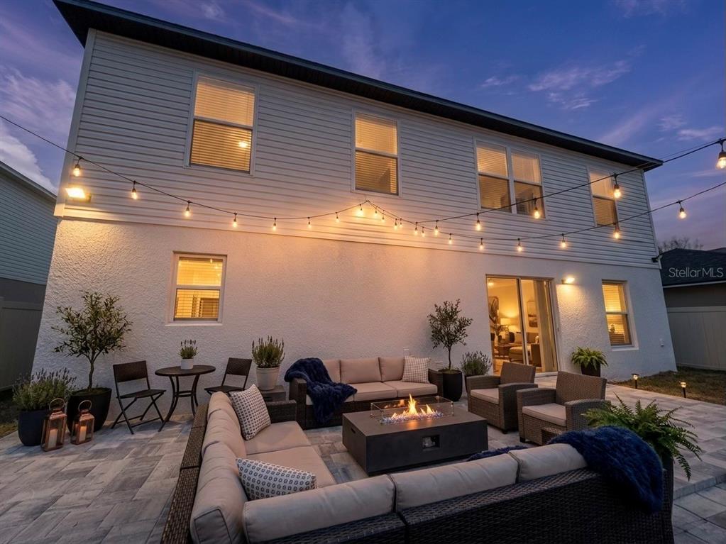 2109 Aitkin Loop Leesburg, FL 34748 - Photo 29 of 33 a outdoor living space with furniture and a potted plant