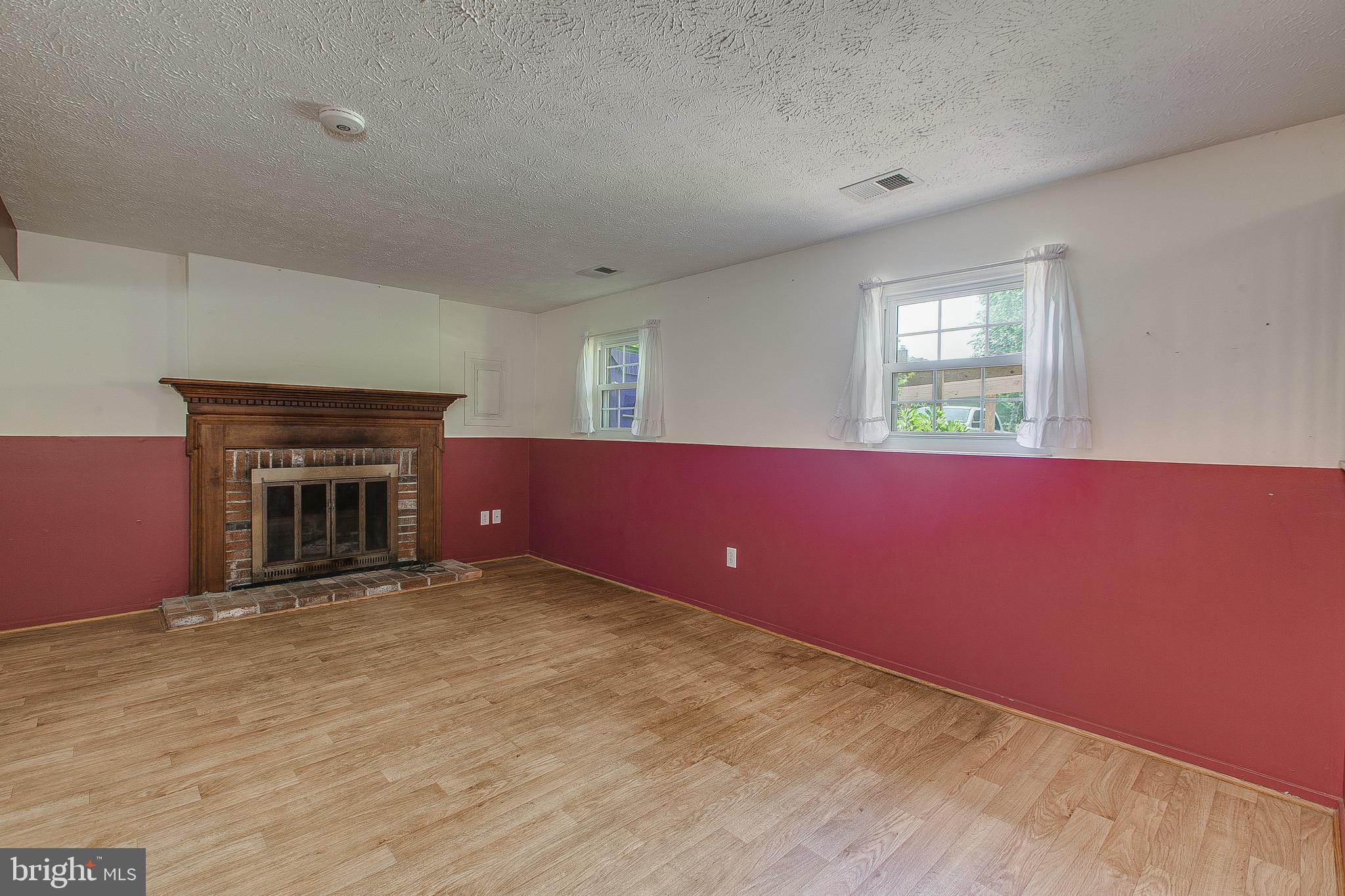 4318 Zircon Road Middletown, MD 21769 - Photo 16 of 36 Family room with wood burning fireplace