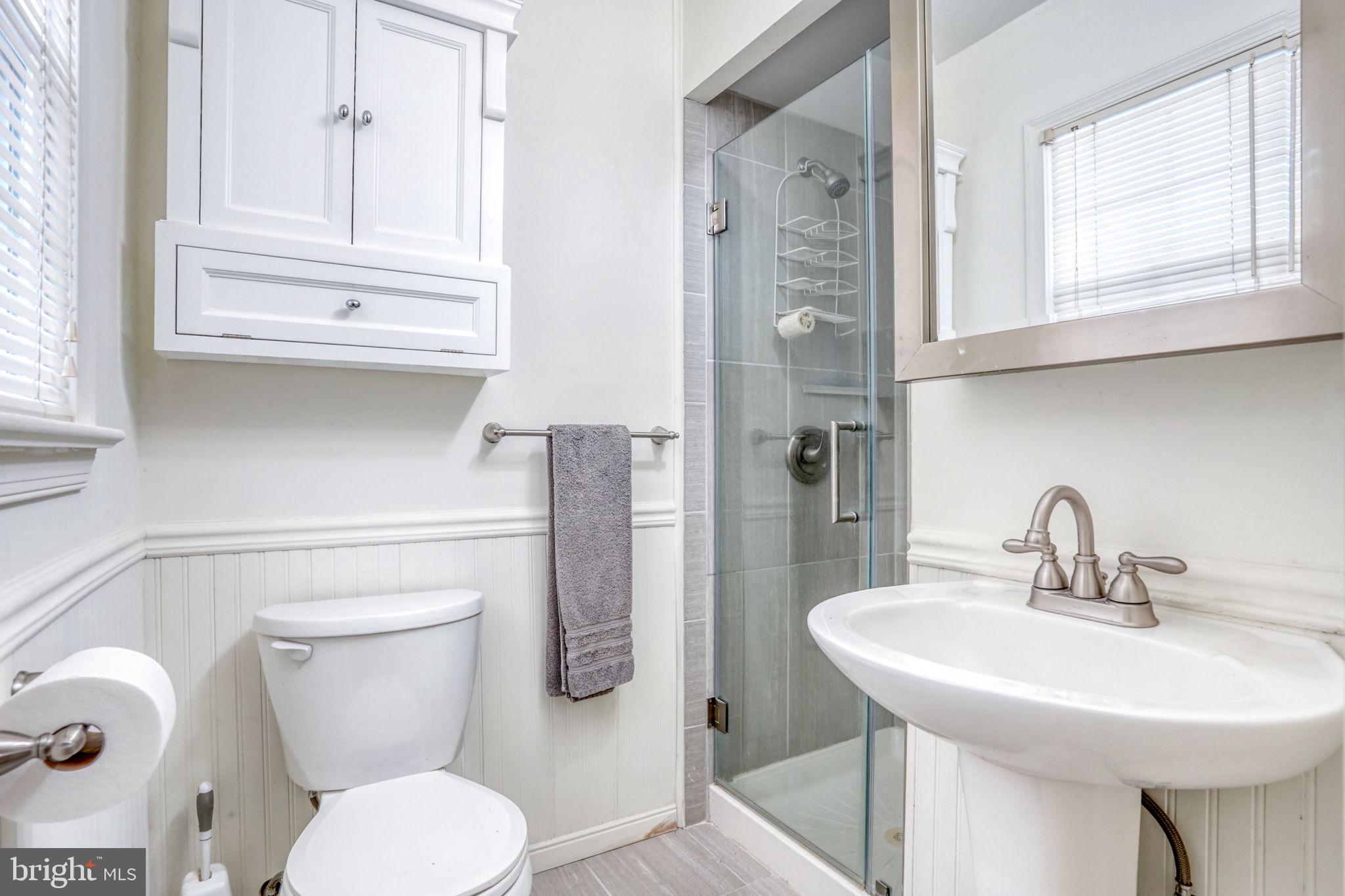 131 Rodric Terrace Dover, DE 19901 - Photo 27 of 45 a bathroom with a toilet sink and a mirror