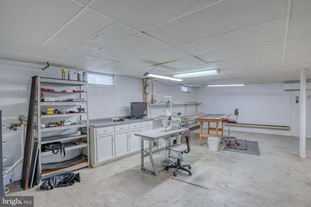 a workspace with furniture and a table