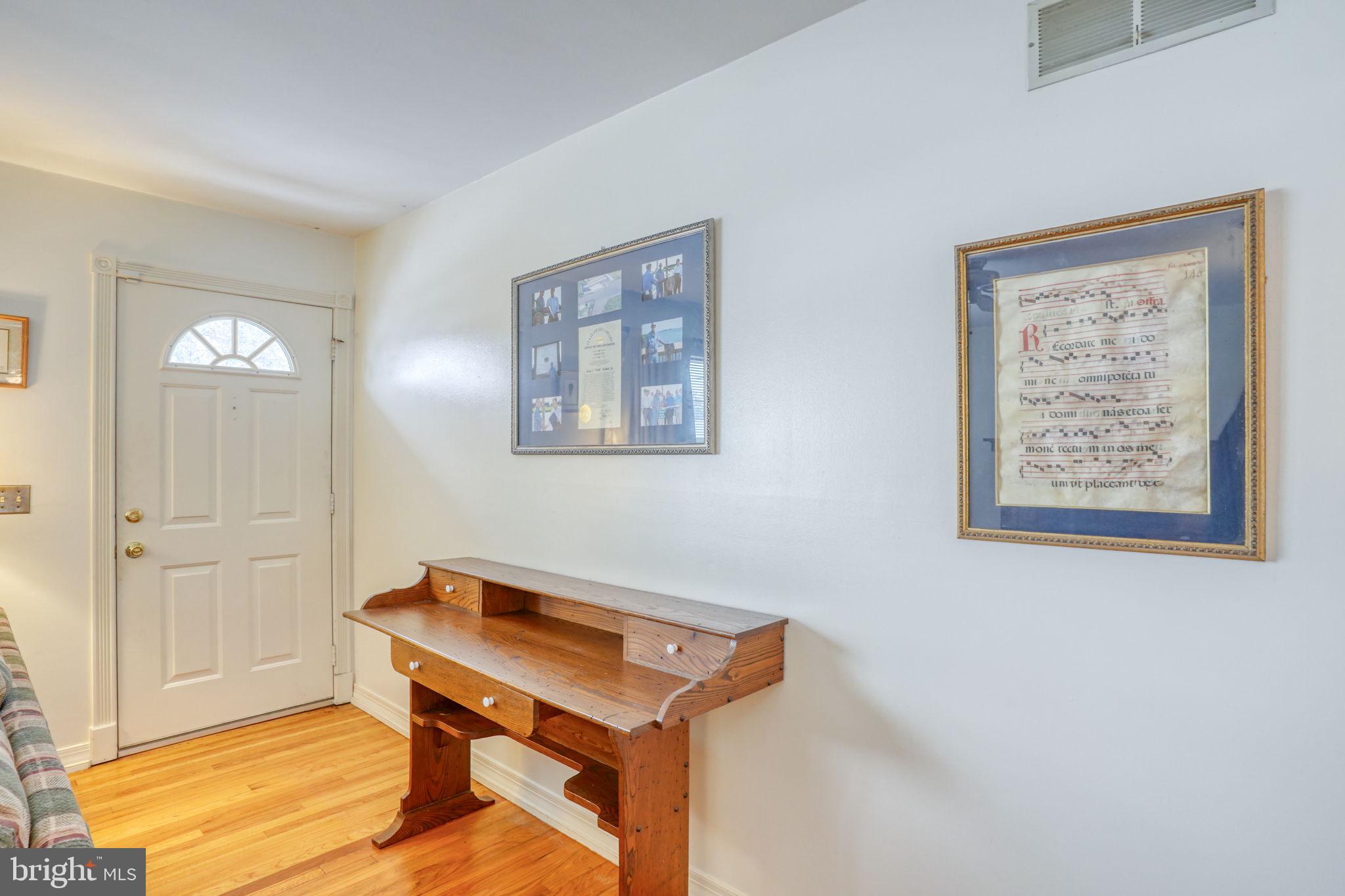 131 Rodric Terrace Dover, DE 19901 - Photo 32 of 45 a room with a table and a window