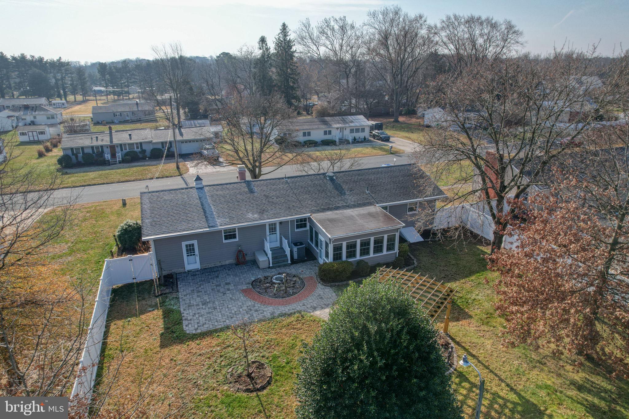 131 Rodric Terrace Dover, DE 19901 - Photo 39 of 45 an aerial view of a house with swimming pool and a yard