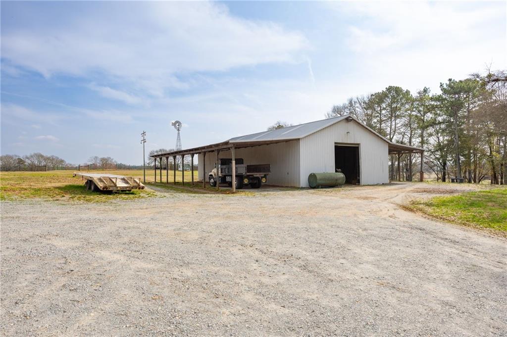 31 Old Harden Bridge Road Southwest Taylorsville, GA 30178 - Photo 98 of 103 a view of swimming pool with outdoor seating and yard in back