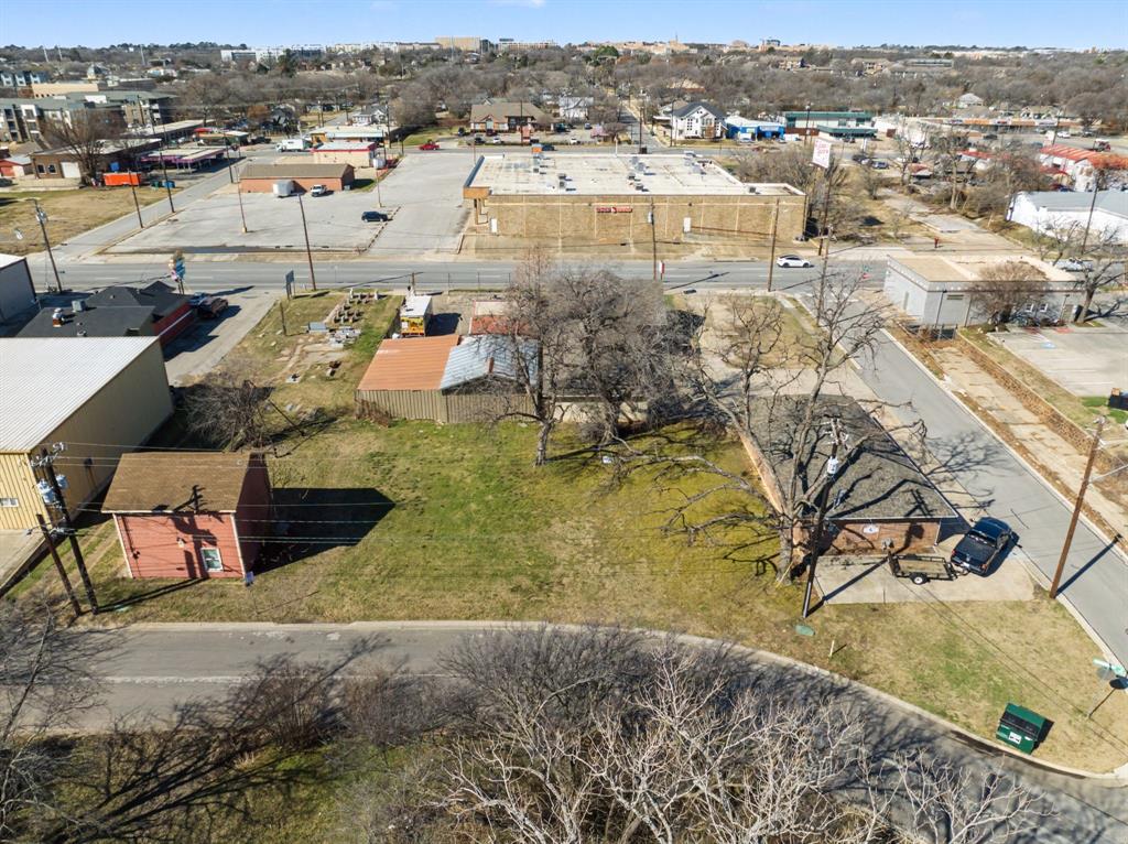 606 Wainwright Street Denton, TX 76201 - Photo 6 of 14 an aerial view of residential houses with outdoor space