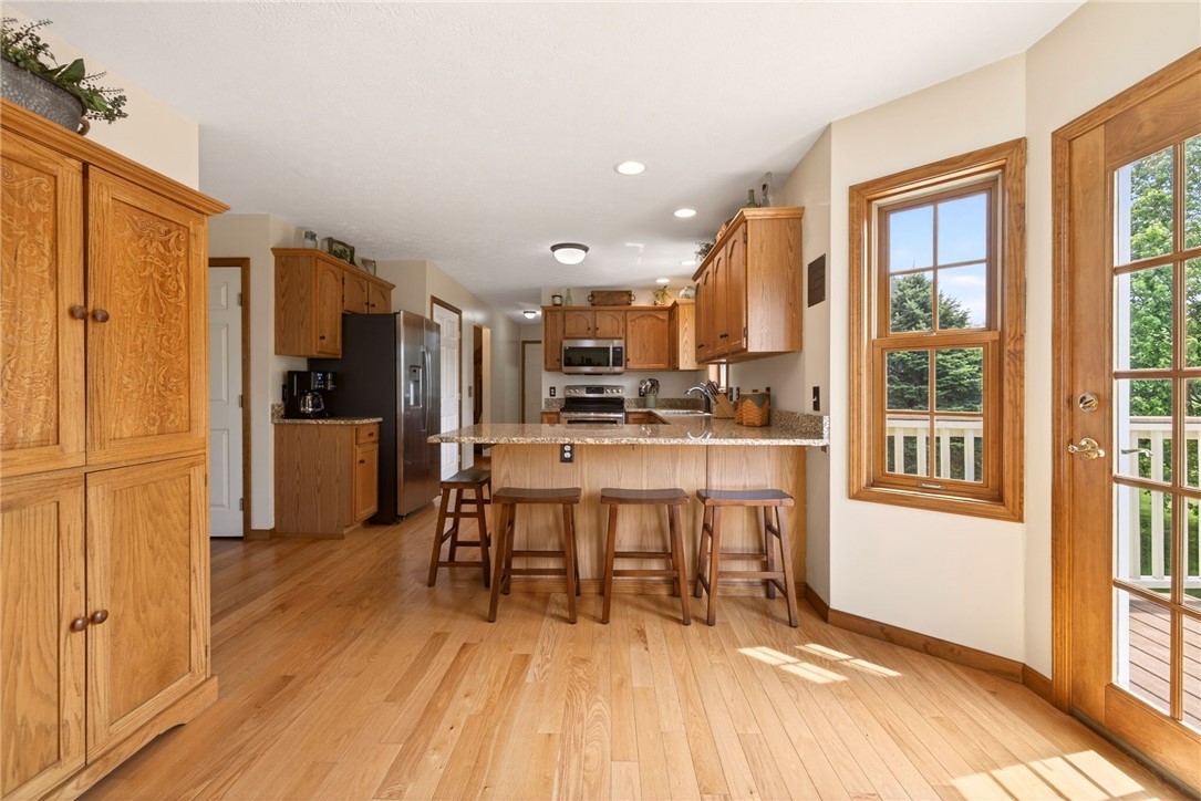 3249 Big Ridge Road Ogden, NY 14559 - Photo 15 of 50 Great room to the kitchen