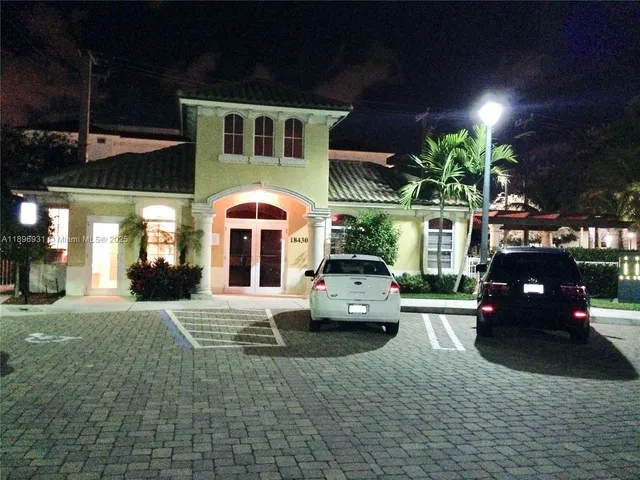 a view of swimming pool from a yard