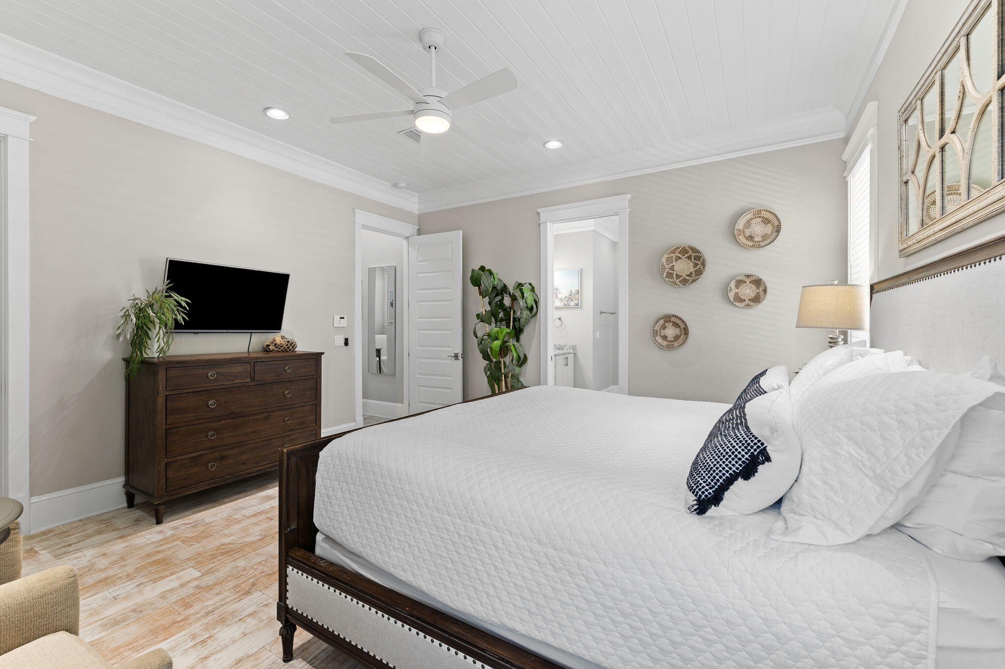 19 West Chester Street Inlet Beach, FL 32461 - Photo 11 of 49 a bedroom with a bed and flat screen tv