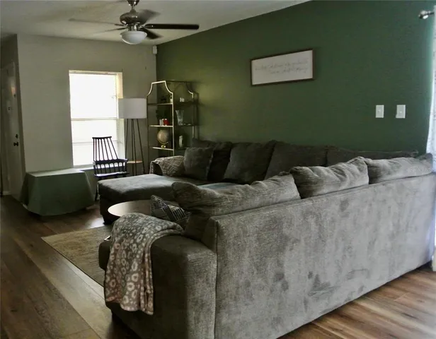 a living room with furniture and a couch