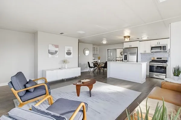 a living room with furniture and a table