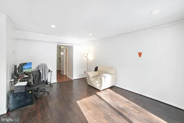 a very nice looking room with wooden floor