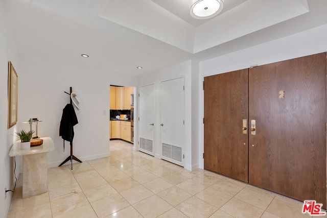 a view of kitchen with furniture and window