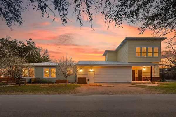 front view of a house with a street