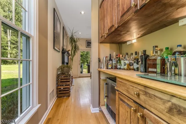 a view of a living room with windows