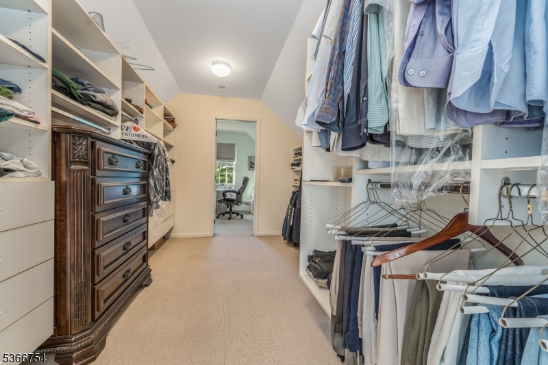 93 Bissell Road Lebanon, NJ 08833 - Photo 20 of 32 a view of walk in closet with clothes and shoes