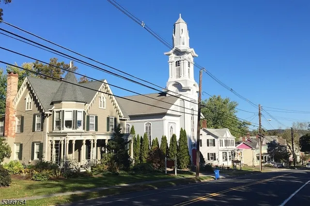 a view of a building with a yard