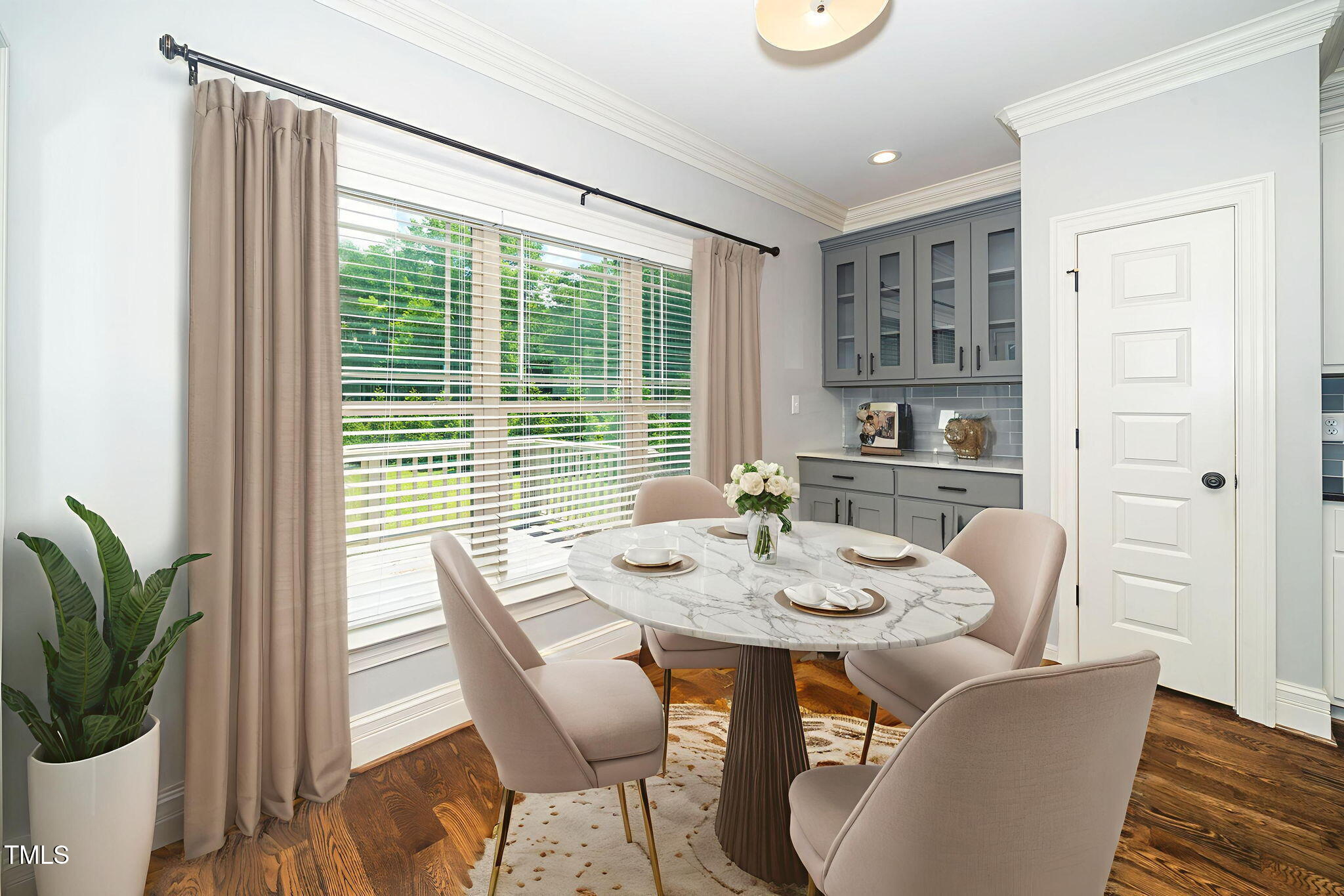 6737 Dwight Rowland Road Willow Spring, NC 27592 - Photo 13 of 50 a view of a dining room with furniture window and wooden floor