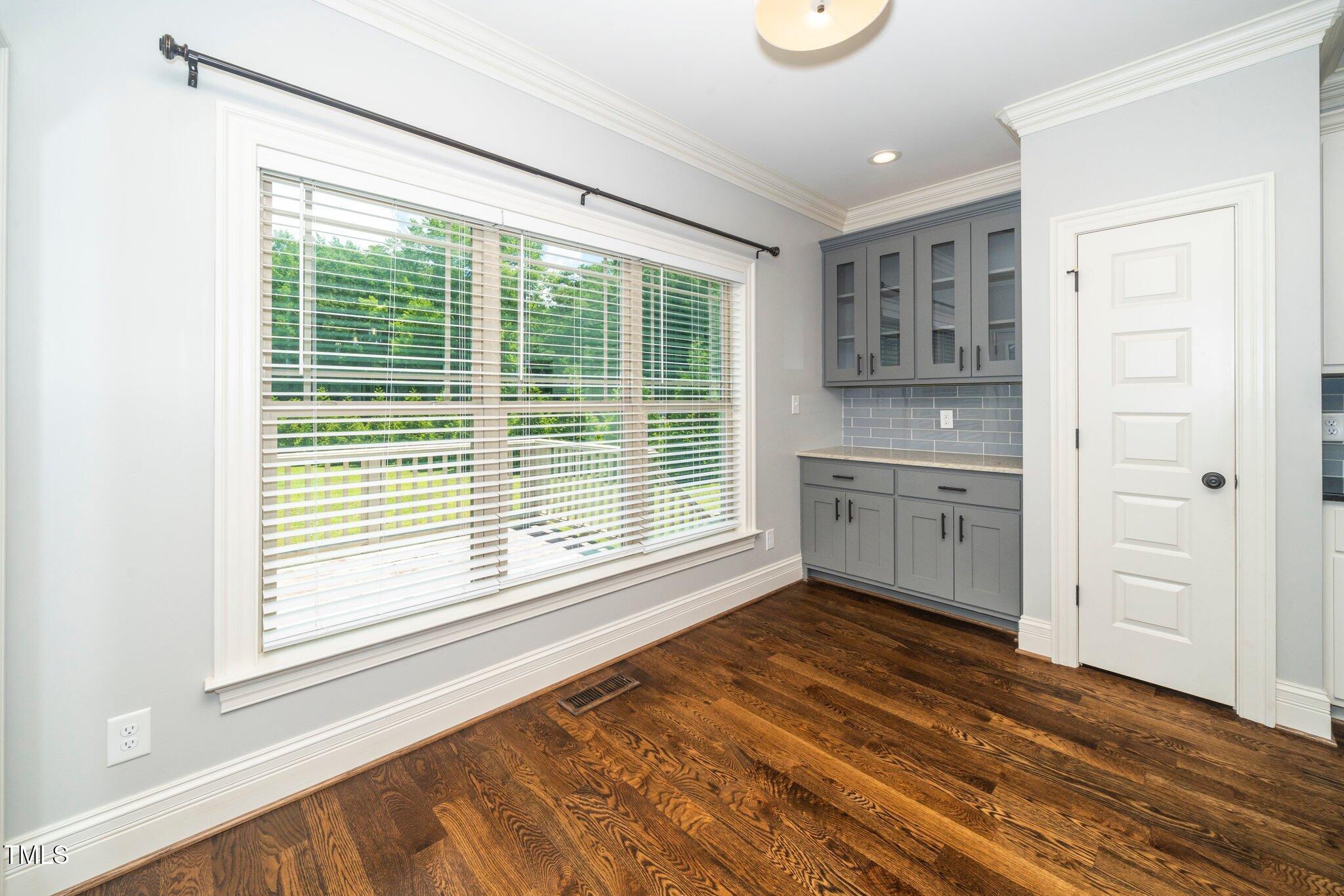 6737 Dwight Rowland Road Willow Spring, NC 27592 - Photo 14 of 50 a view of a kitchen and a window