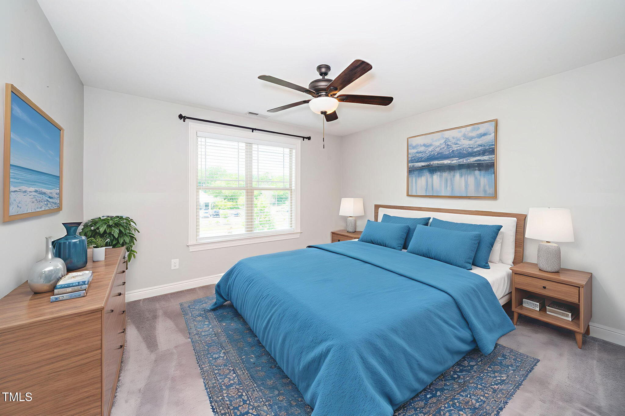 6737 Dwight Rowland Road Willow Spring, NC 27592 - Photo 34 of 50 a bedroom with a bed and a window