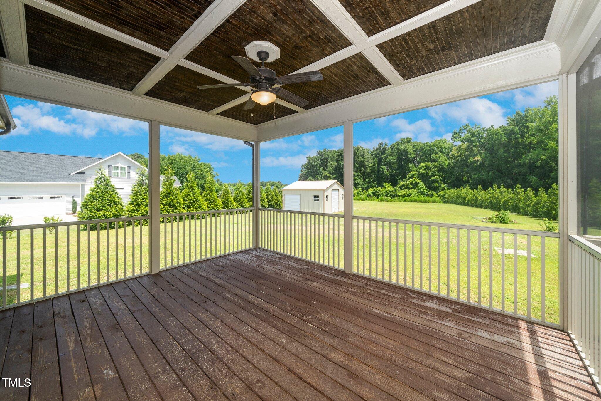 6737 Dwight Rowland Road Willow Spring, NC 27592 - Photo 43 of 50 a view of a roof deck