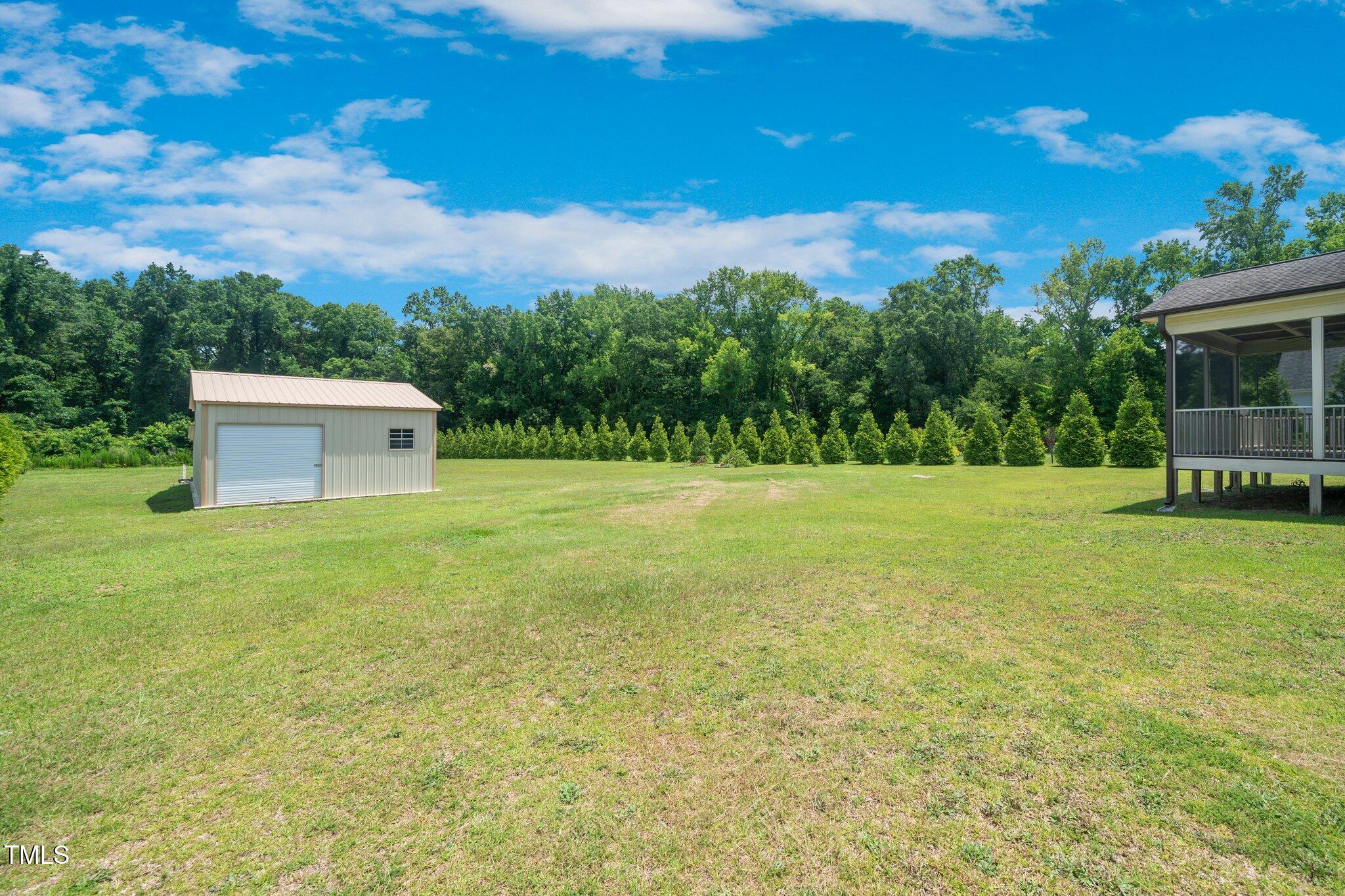 6737 Dwight Rowland Road Willow Spring, NC 27592 - Photo 45 of 50 a view of a trees with a big yard