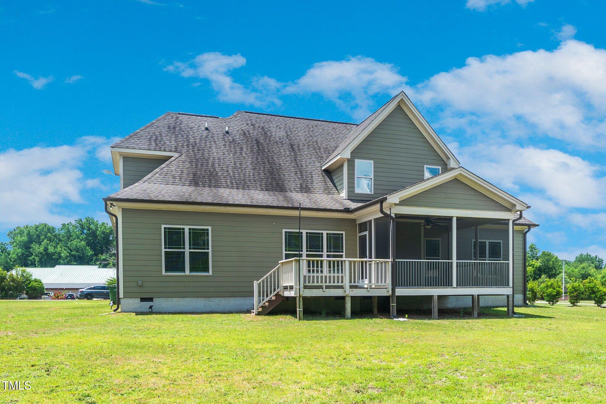 6737 Dwight Rowland Road Willow Spring, NC 27592 - Photo 50 of 50 a view of a house with a yard