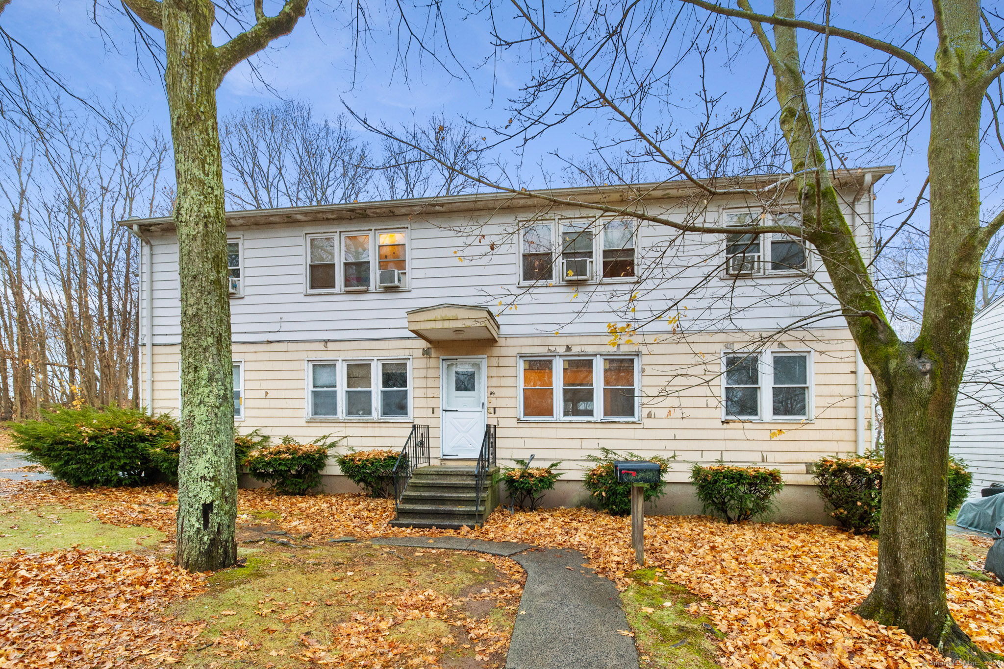 69 Oak Ridge Drive, Unit 51 New Haven, CT 06513 - Photo 1 of 1 front view of a house with a yard
