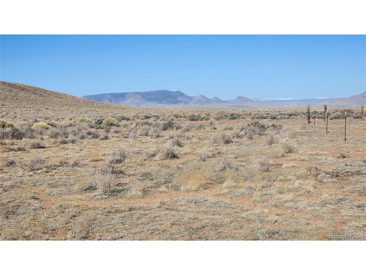44 Collins Court Sanford, CO 81151 - Photo 12 of 15 a black and white photo of a field