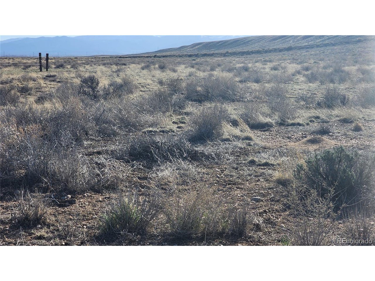 44 Collins Court Sanford, CO 81151 - Photo 14 of 15 a black and white photo of a house