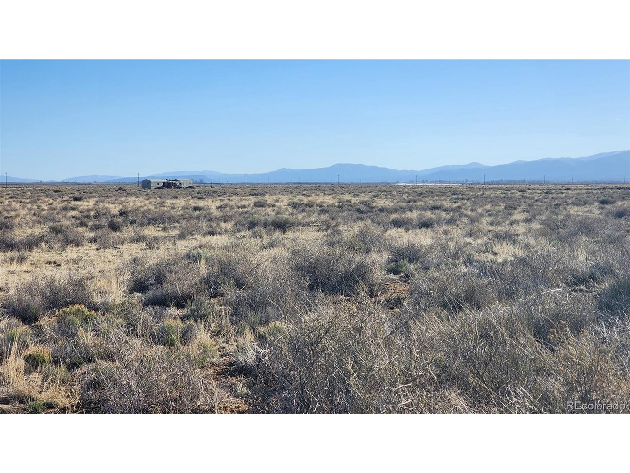 44 Collins Court Sanford, CO 81151 - Photo 9 of 15 a open area with a yard
