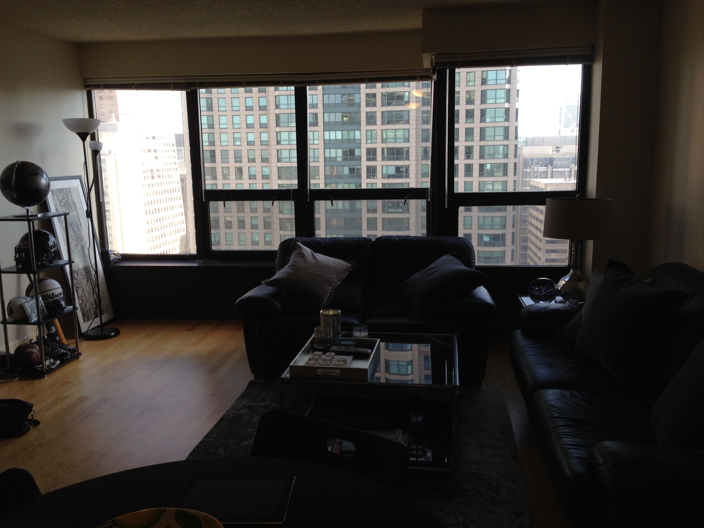 30 East Huron Street, Unit 3901 Chicago, IL 60611 - Photo 4 of 13 a living room with furniture and a flat screen tv