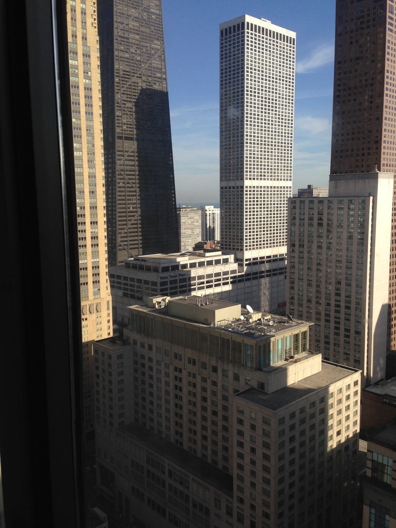 30 East Huron Street, Unit 3901 Chicago, IL 60611 - Photo 10 of 13 a bathroom with a sink and a mirror