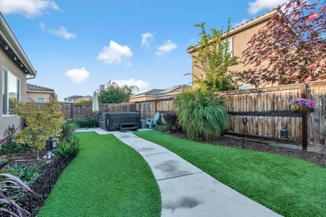 a house view with a garden space