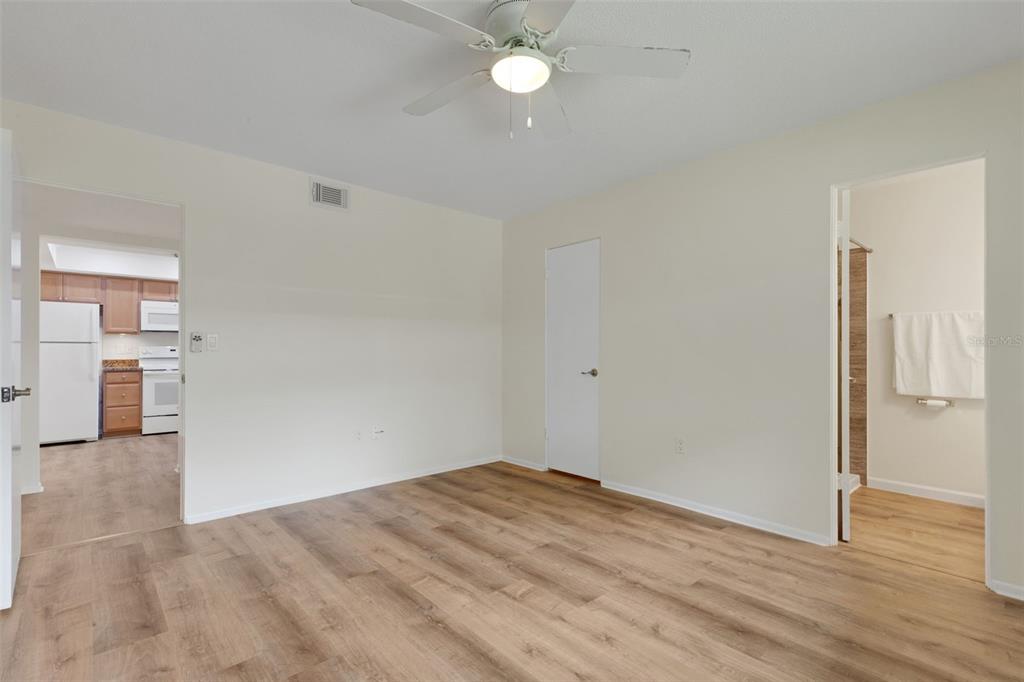 66 Strathmore Boulevard Sarasota, FL 34233 - Photo 19 of 39 a view of empty room with wooden floor
