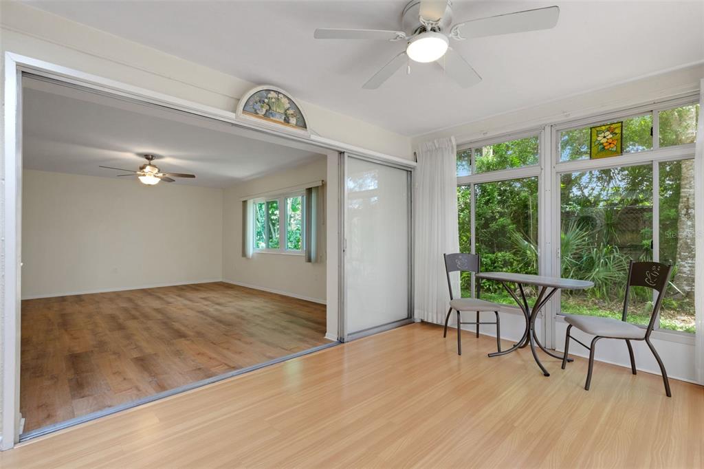 66 Strathmore Boulevard Sarasota, FL 34233 - Photo 22 of 39 a view of a livingroom with furniture and a window