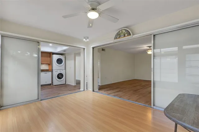 a view of a hallway with a chandelier