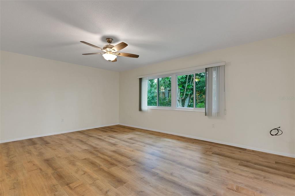 66 Strathmore Boulevard Sarasota, FL 34233 - Photo 24 of 39 a view of an empty room with a window