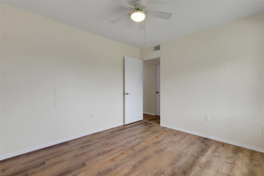 66 Strathmore Boulevard Sarasota, FL 34233 - Photo 31 of 39 wooden floor in an empty room