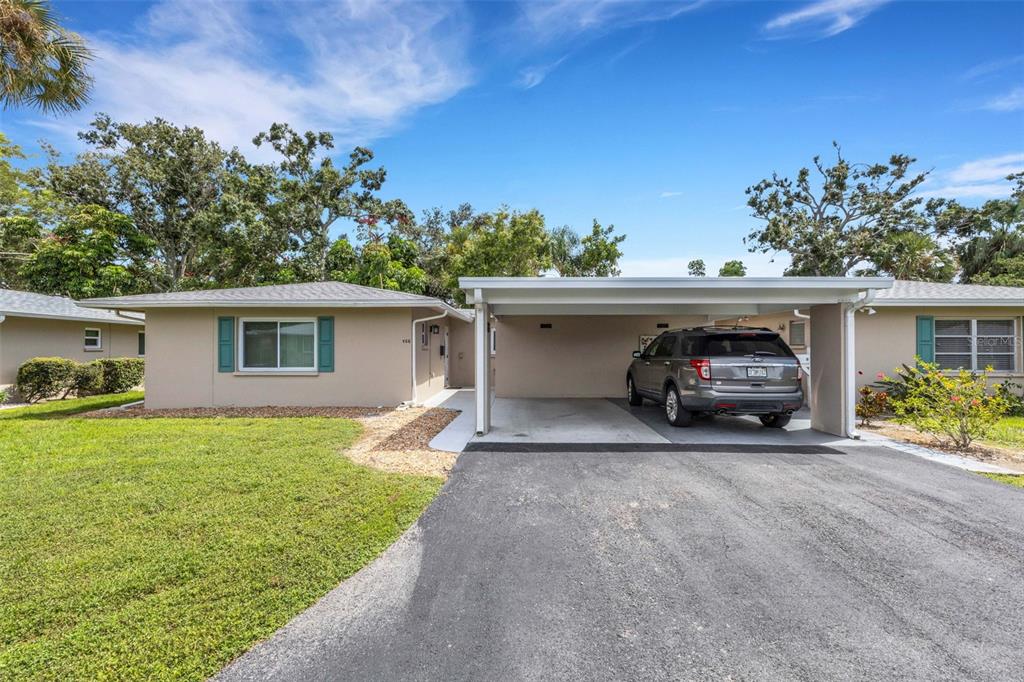 66 Strathmore Boulevard Sarasota, FL 34233 - Photo 39 of 39 a view of a house and outdoor space